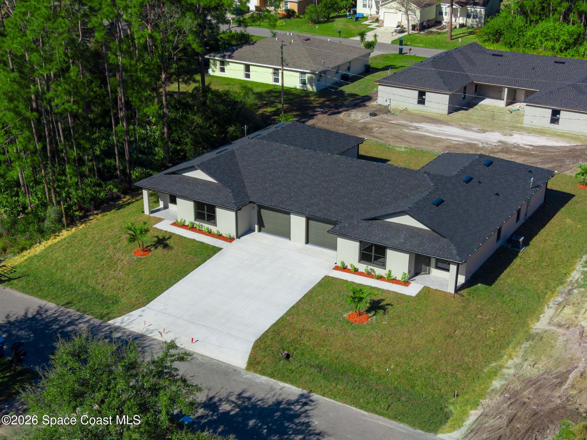 1659 Javier Street, Unit AB Palm Bay, FL 32909 - Photo 5 of 32 32-web-or-mls-Drone-3