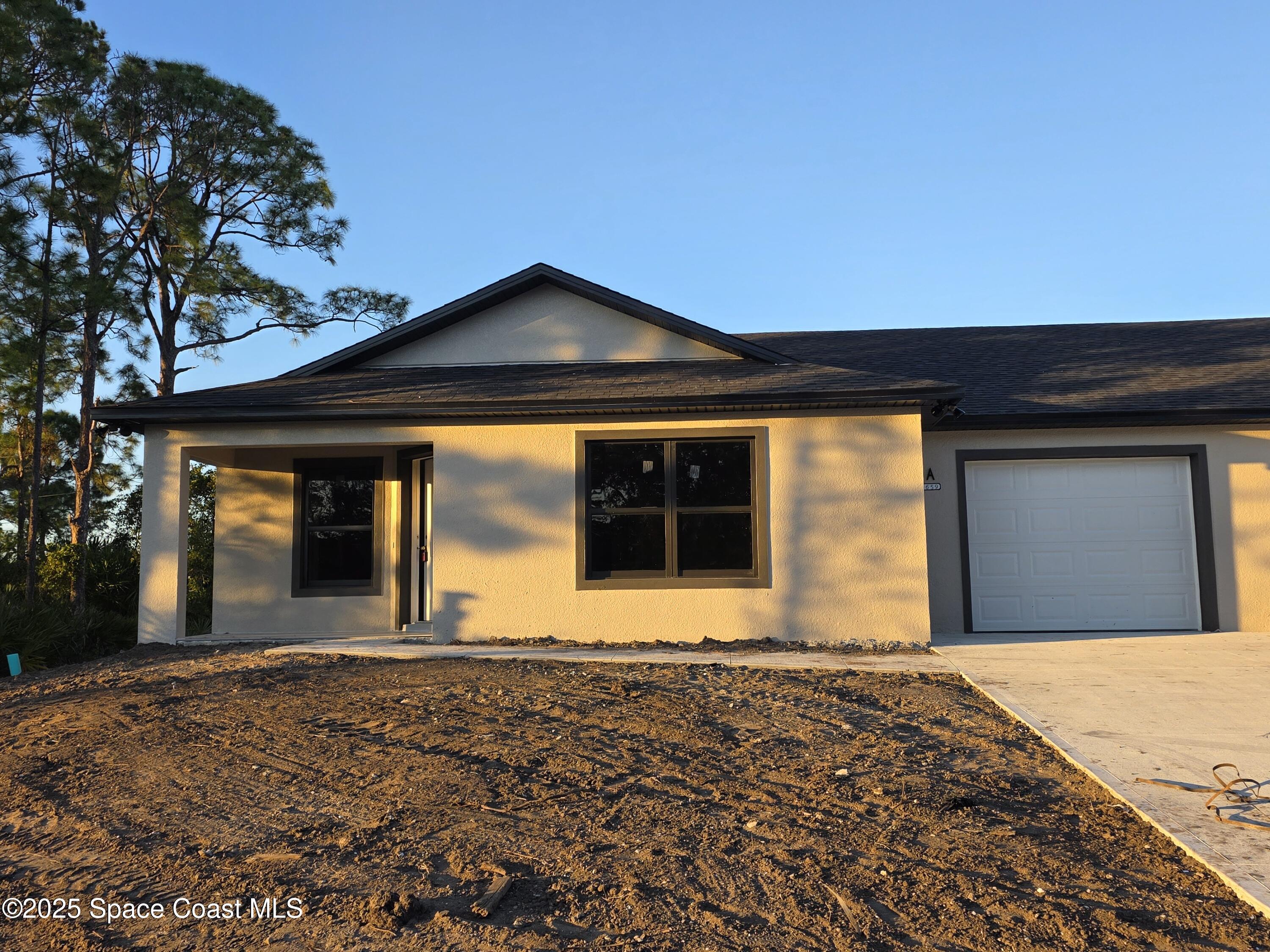 1659 Javier Street, Unit AB Palm Bay, FL 32909 - Photo 5 of 37 20251116_165940