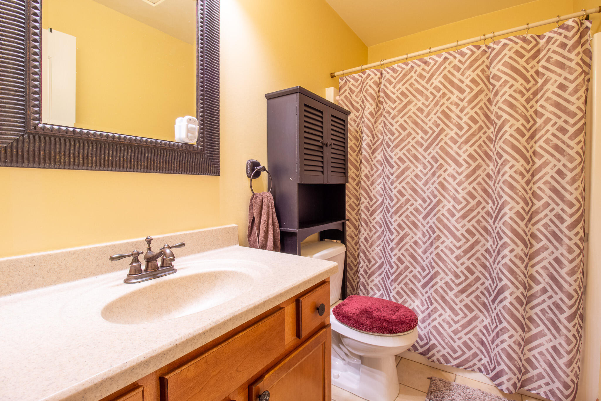 2550 Honelee Court Valparaiso, IN 46385 - Photo 33 of 37 a bathroom with a sink toilet and shower