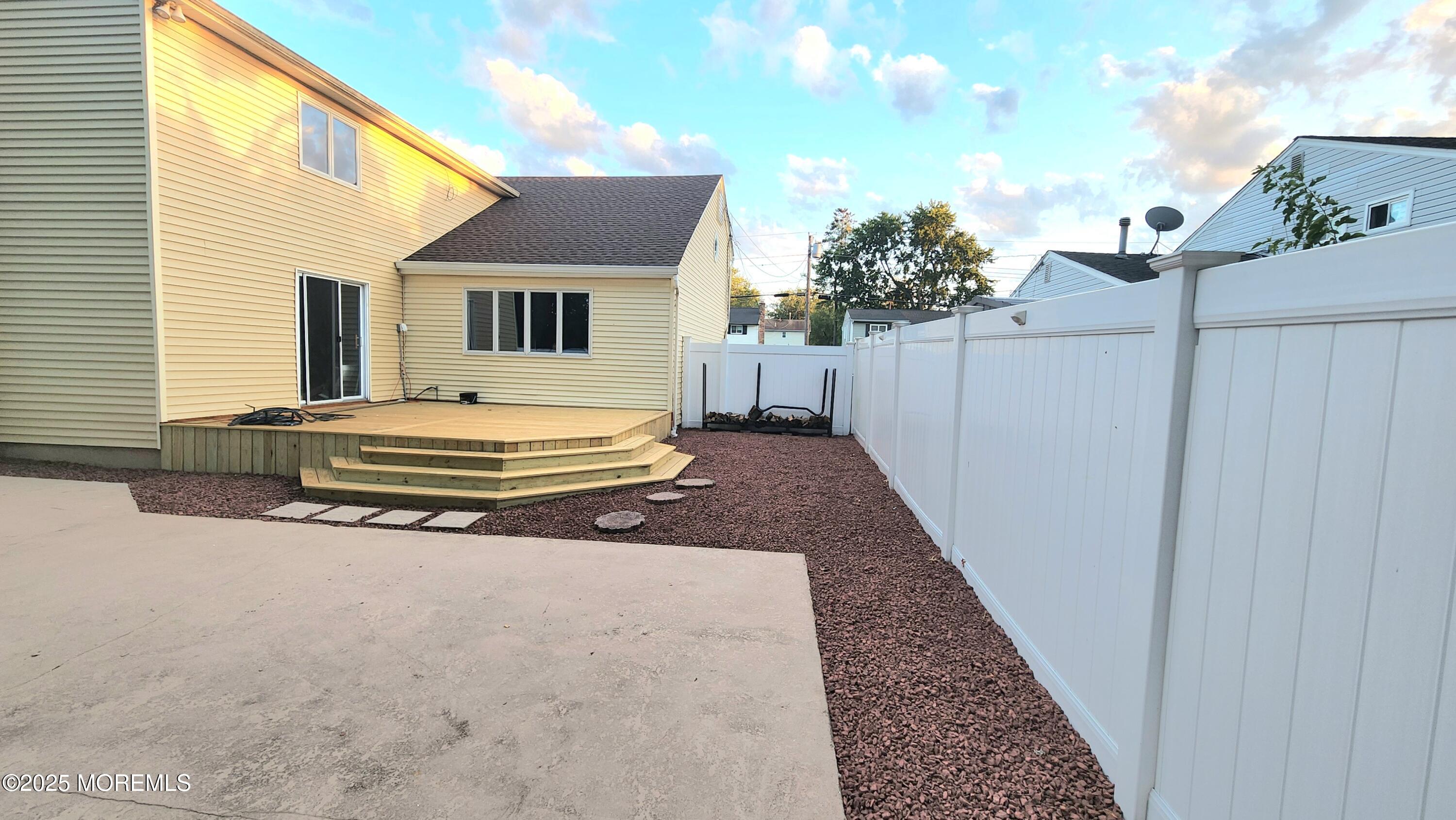 34 Hemlock Street Hazlet, NJ 07730 - Photo 22 of 30 a front view of a house with a yard