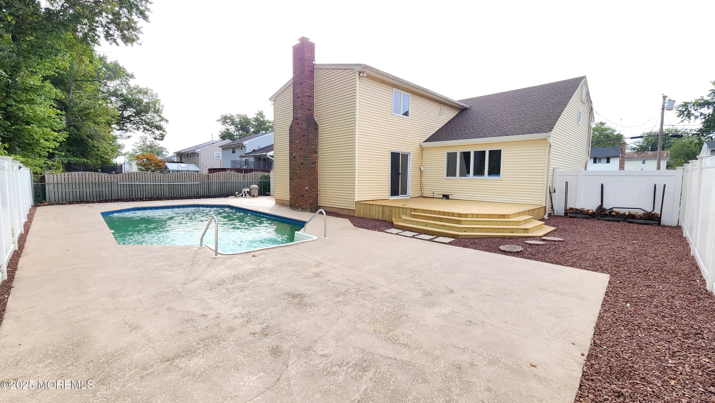 34 Hemlock Street Hazlet, NJ 07730 - Photo 26 of 30 a view of a house with backyard and trees