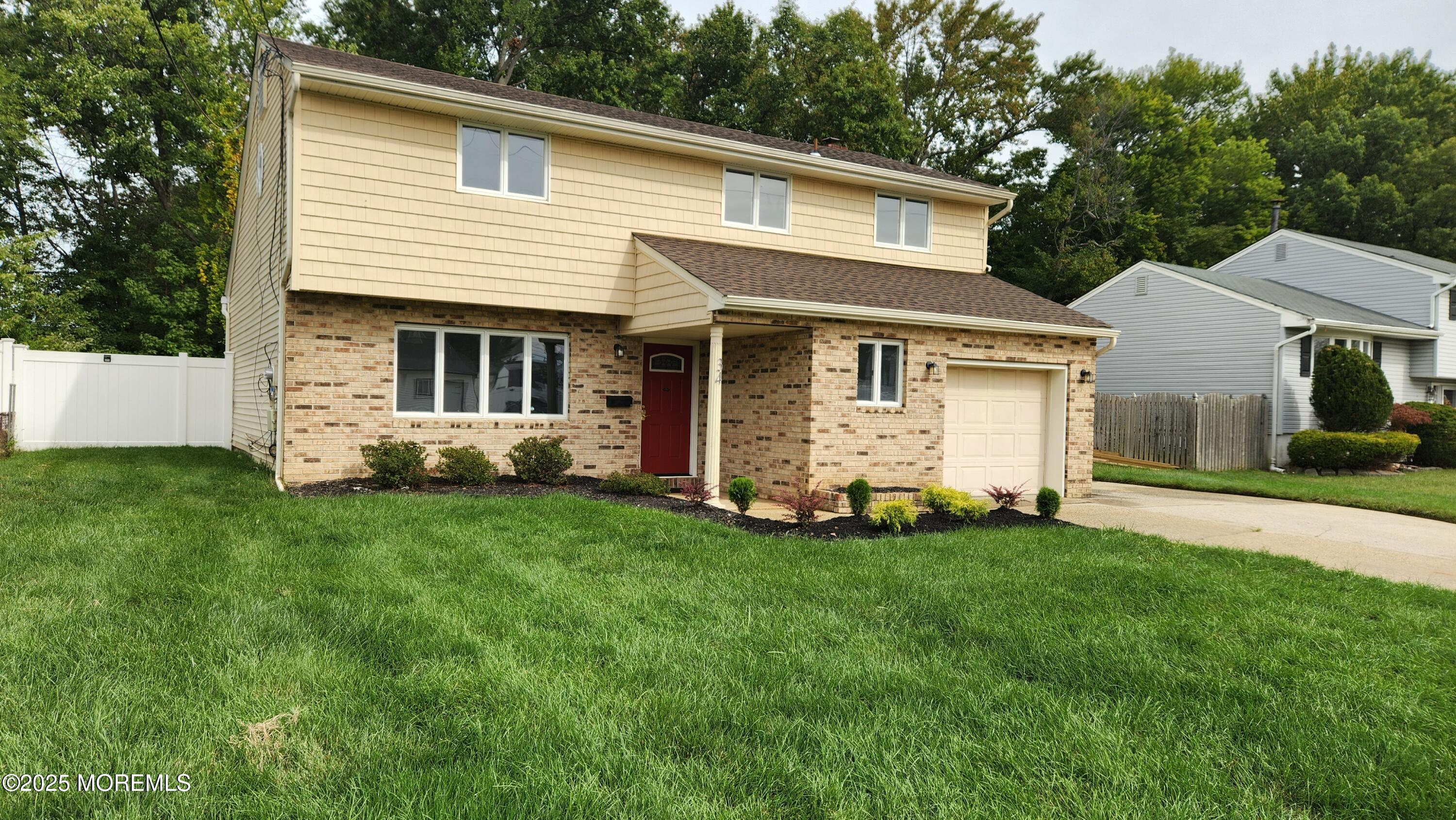 34 Hemlock Street Hazlet, NJ 07730 - Photo 29 of 30 a view of a house with a backyard