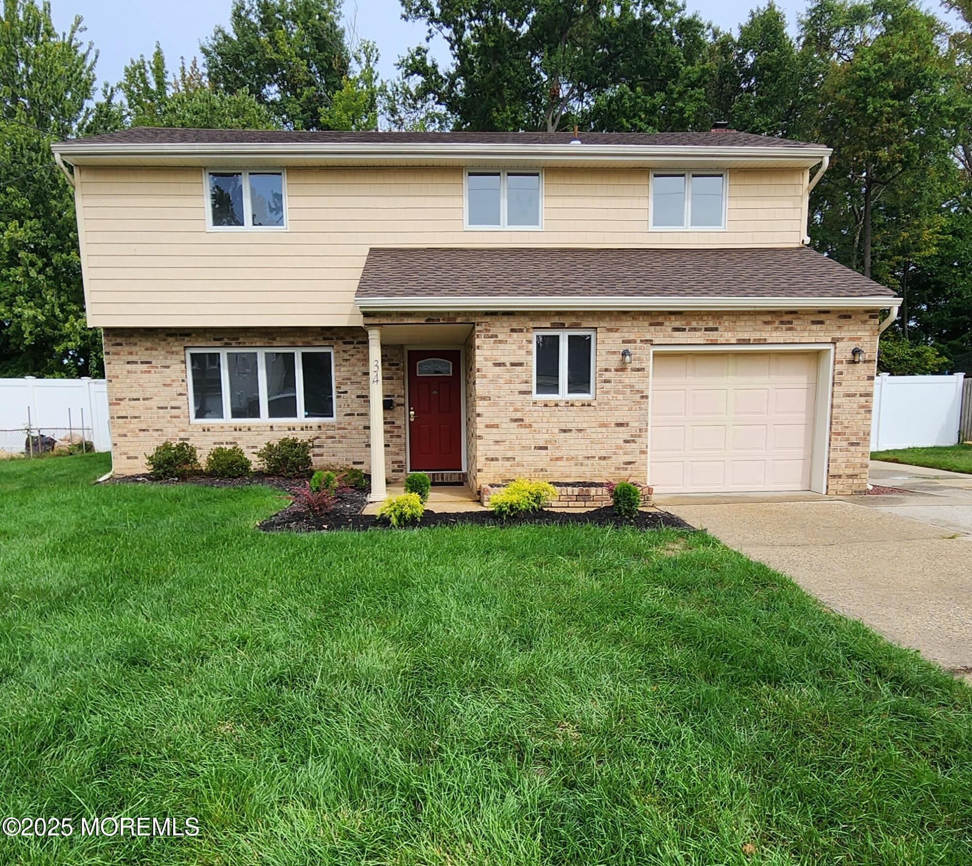 34 Hemlock Street Hazlet, NJ 07730 - Photo 30 of 30 a front view of house with yard and green space