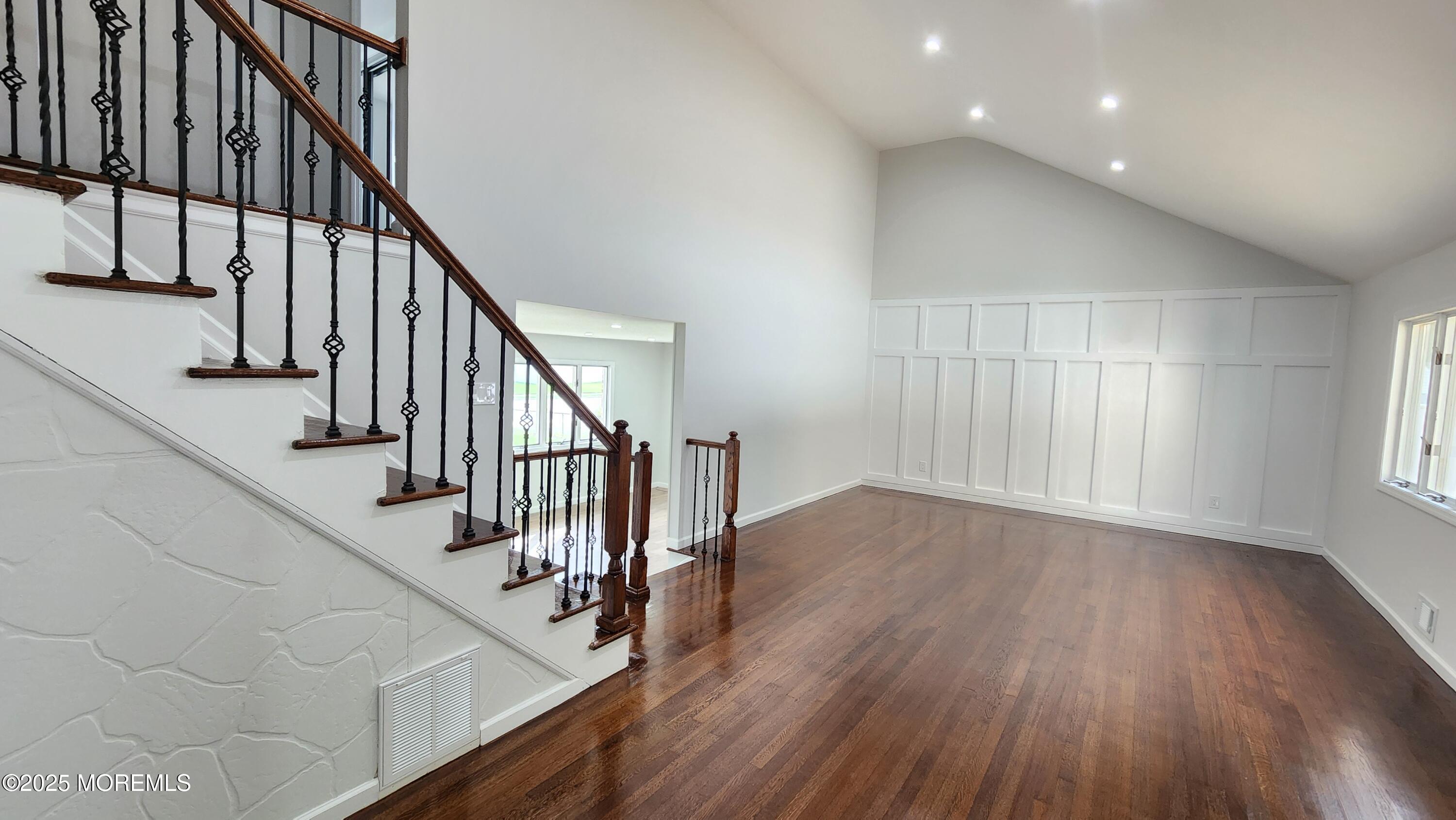 34 Hemlock Street Hazlet, NJ 07730 - Photo 9 of 30 a view of staircase with wooden floor and white walls