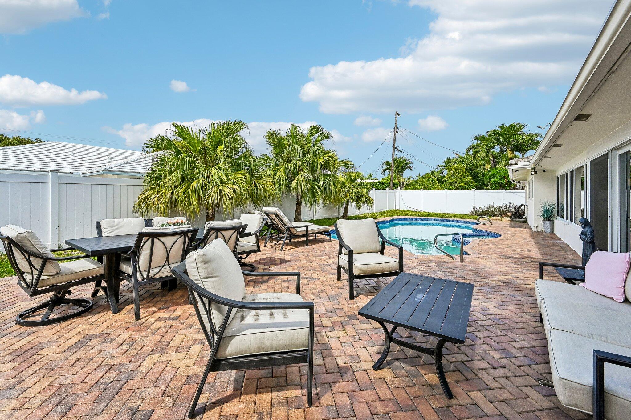 2940 Northeast 39th Court Lighthouse Point, FL 33064 - Photo 32 of 42 an outdoor space with furniture
