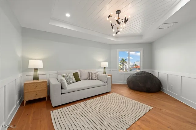 a bedroom with bed and window