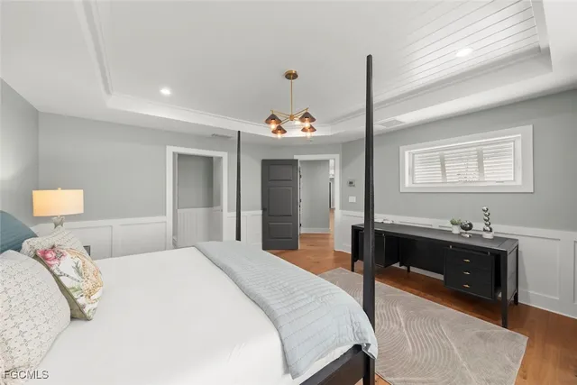 a bathroom with a granite countertop sink mirror and a