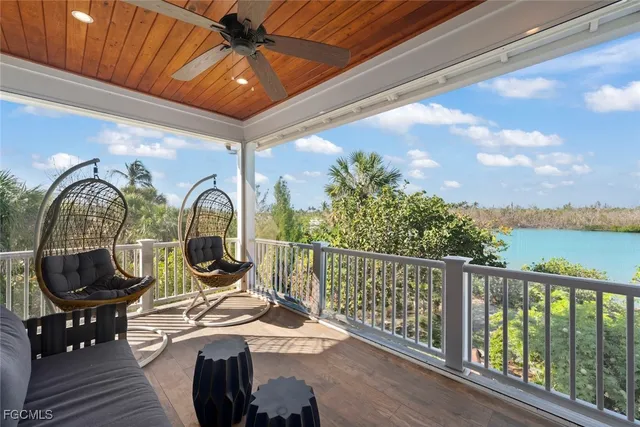 a living room with lots of furniture and a flat screen tv