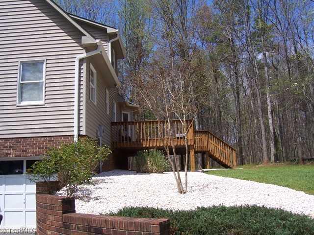 156 McDaniel Road Advance, NC 27006 - Photo 8 of 8 Patio/Deck. Large 23x12 deck overlooking spacious back yard.