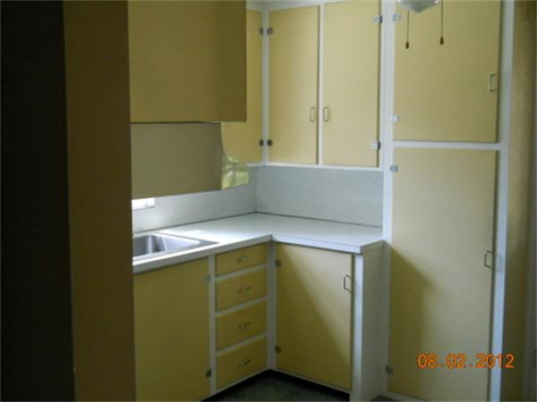 173 Abbott Street Springfield, MA 01118 - Photo 12 of 19 a kitchen with a refrigerator and a sink