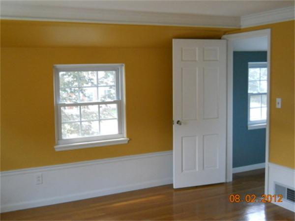 173 Abbott Street Springfield, MA 01118 - Photo 13 of 19 a view of an empty room with wooden floor and a window