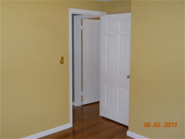 173 Abbott Street Springfield, MA 01118 - Photo 17 of 19 a view of door with wooden floor
