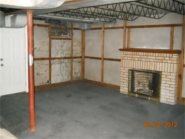 173 Abbott Street Springfield, MA 01118 - Photo 18 of 19 a view of a room with racks on the wall