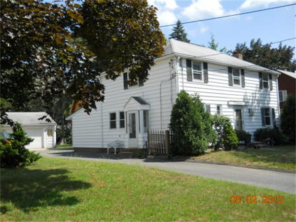 173 Abbott Street Springfield, MA 01118 - Photo 2 of 19 a front view of a house with a yard
