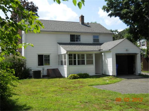 173 Abbott Street Springfield, MA 01118 - Photo 3 of 19 a front view of a house with a yard