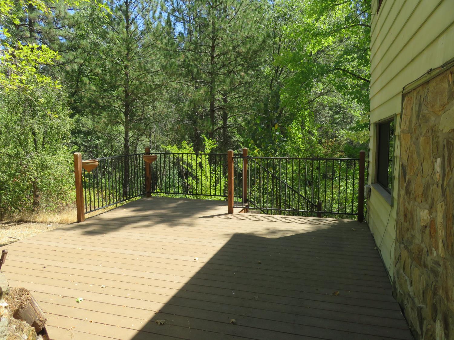 2563 Woodhouse Mine Road West Point, CA 95255 - Photo 18 of 49 a backyard of a house with lots of green space