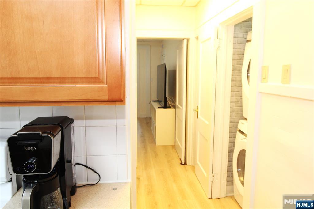 28 Rutland Avenue, Unit 3 Kearny, NJ 07032 - Photo 13 of 13 a bathroom with a toilet and a mirror