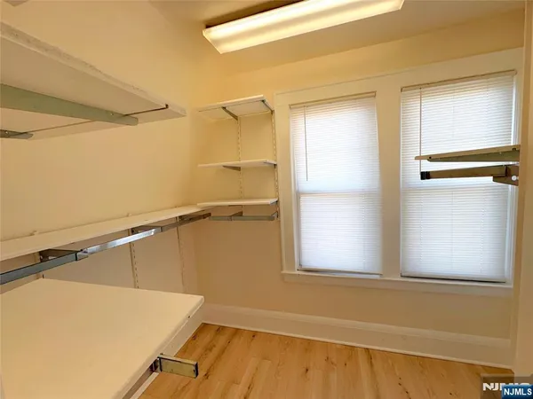 a view of a room with racks on the wall