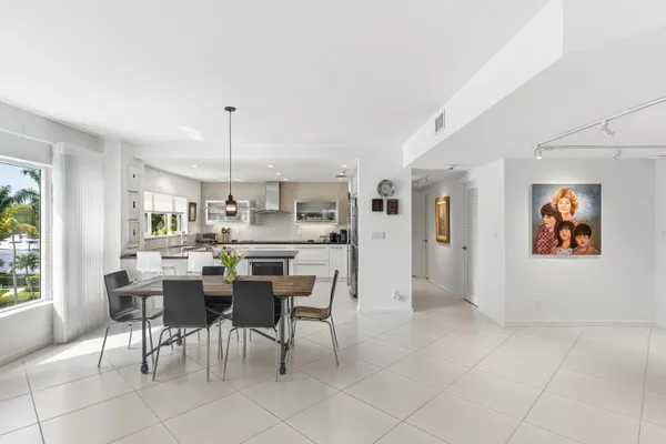 a view of a dining room kitchen and a window