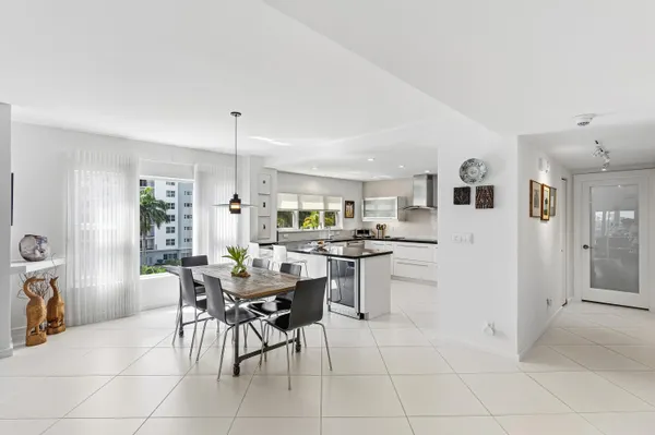 a view of a dining room kitchen and a window