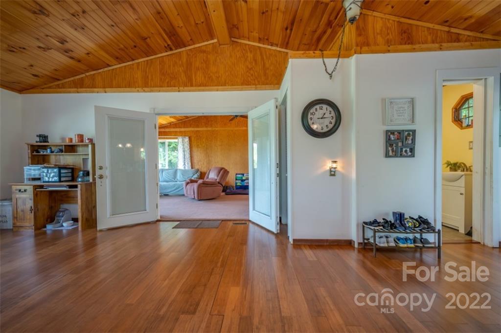 138 Robertson Creek Church Road Bostic, NC 28018 - Photo 10 of 31 a view of a livingroom with wooden floor