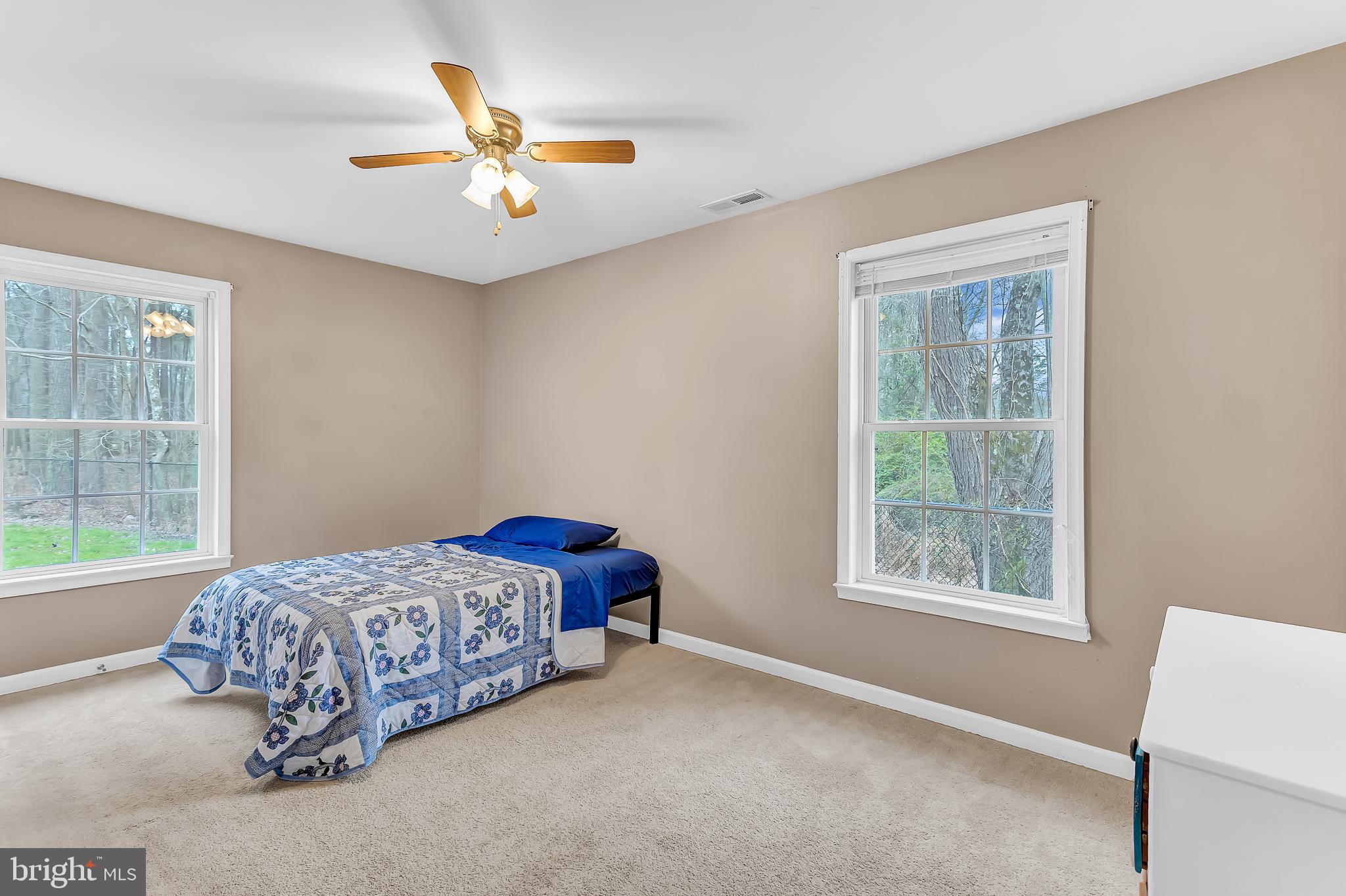 29827 Polks Road Princess Anne, MD 21853 - Photo 19 of 41 a bedroom with bed and window