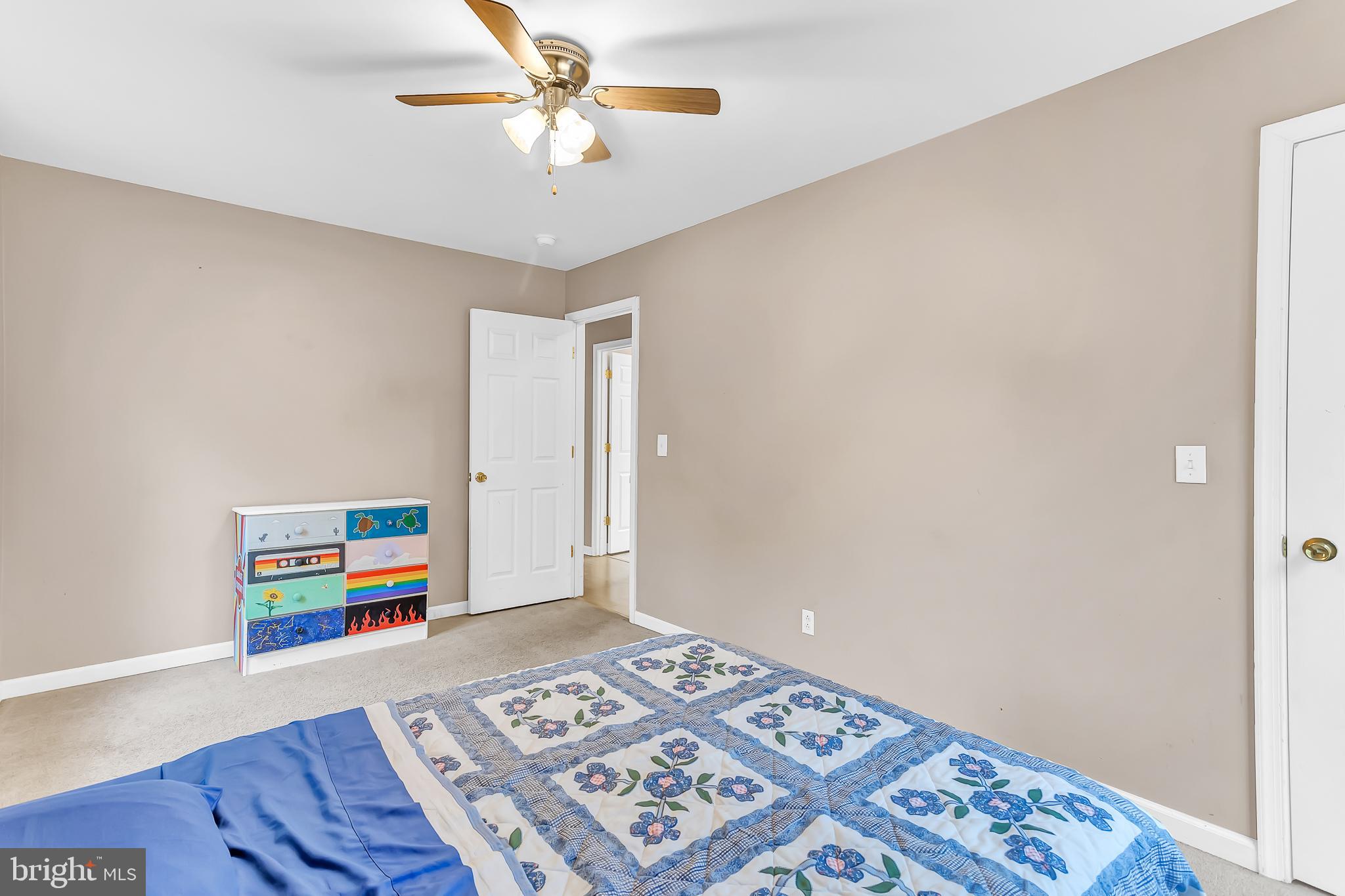 29827 Polks Road Princess Anne, MD 21853 - Photo 20 of 41 a bedroom with furniture and a book shelf