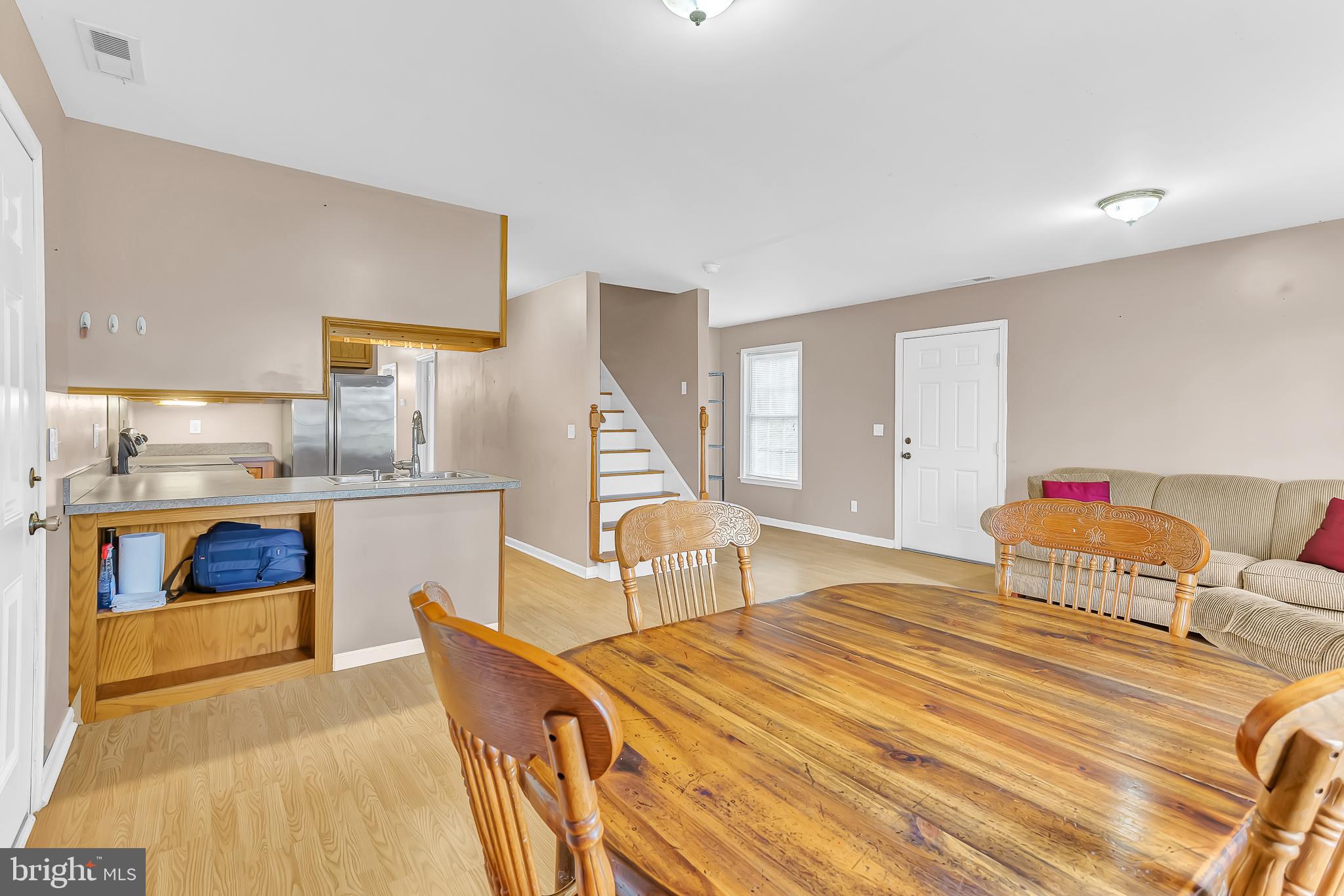 29827 Polks Road Princess Anne, MD 21853 - Photo 8 of 41 a bedroom with a bed and a view of kitchen