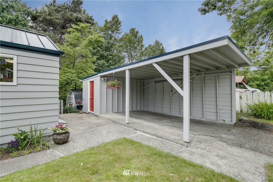 6745 18th Avenue Southwest Seattle, WA 98106 - Photo 24 of 24 a backyard of a house with seating space