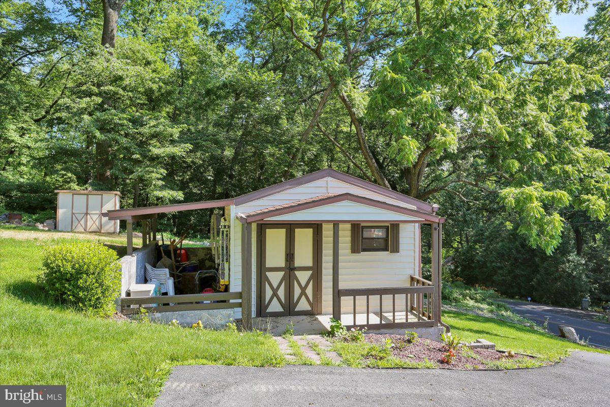 90 Preston Road Wernersville, PA 19565 - Photo 14 of 45 a front view of a house with garden