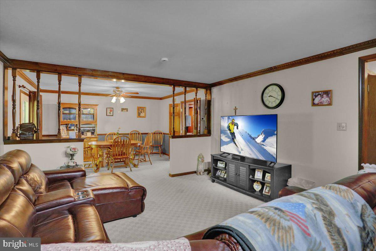 90 Preston Road Wernersville, PA 19565 - Photo 21 of 45 a living room with furniture and a flat screen tv