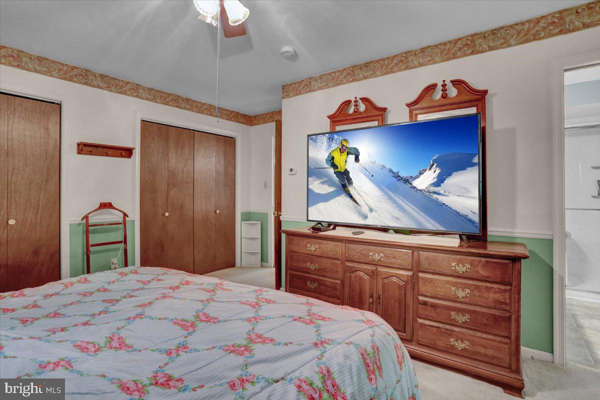 90 Preston Road Wernersville, PA 19565 - Photo 29 of 45 a bedroom with a bed and a dresser with mirror