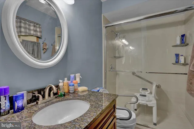 a view of a hallway with dining room and livingroom
