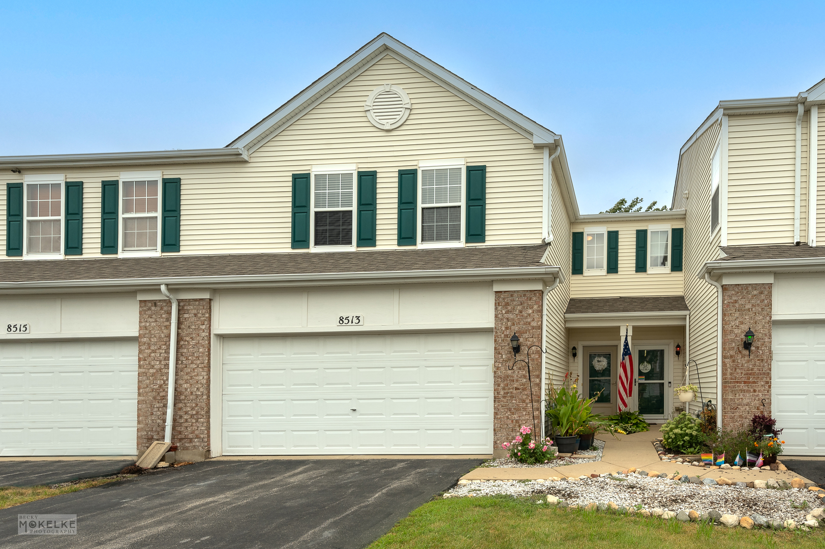 a view of a house with backyard and windows