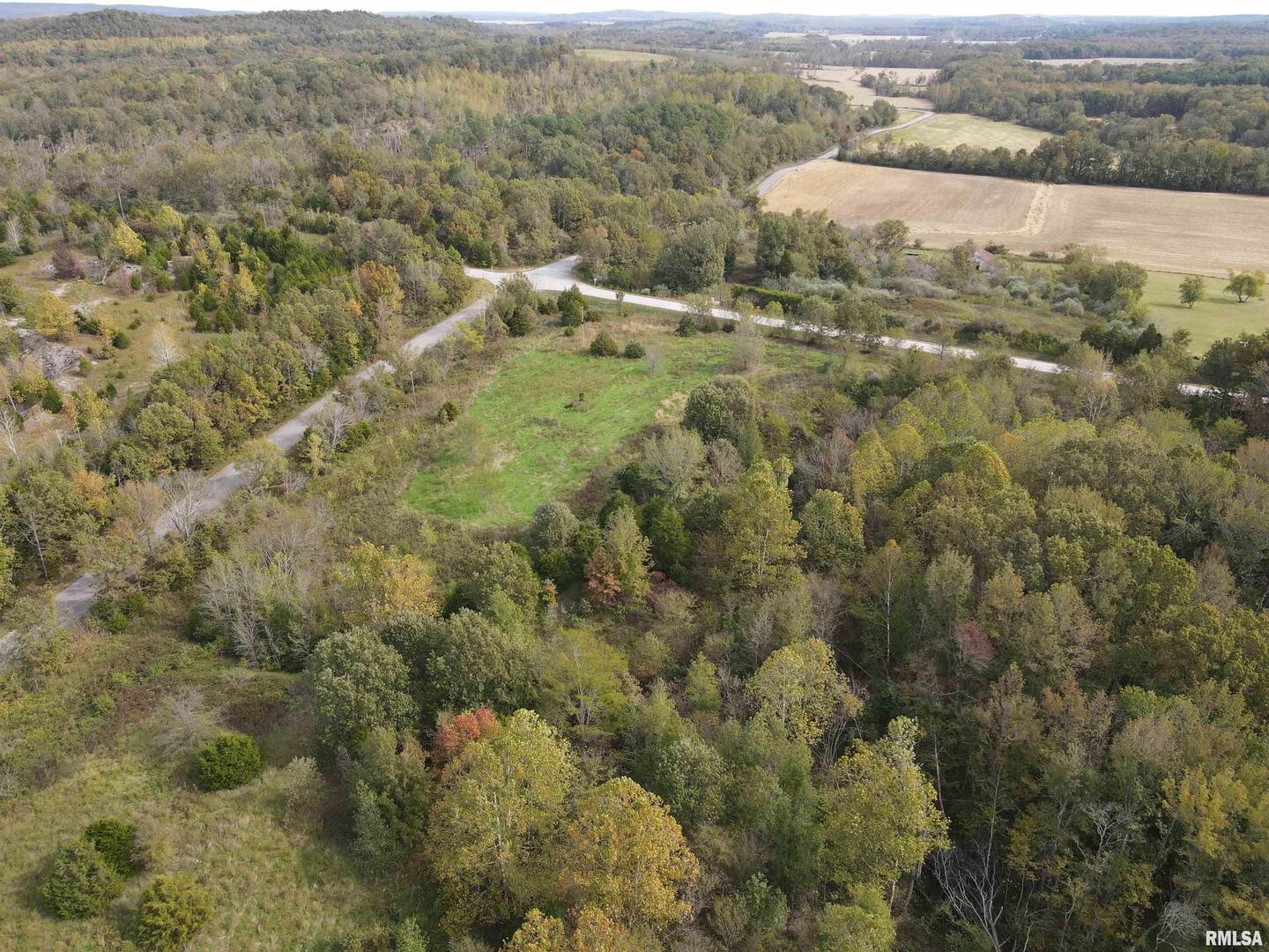 0 North Shawnee Hills Road Equality, IL 62934 - Photo 21 of 22 an aerial view of residential houses with outdoor space and trees