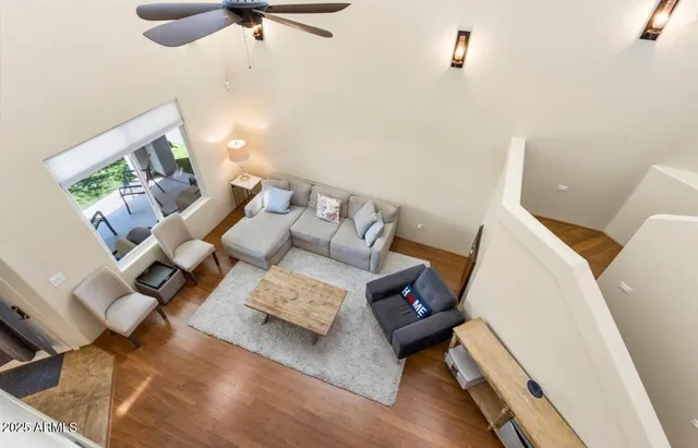 a living room with furniture and a rug