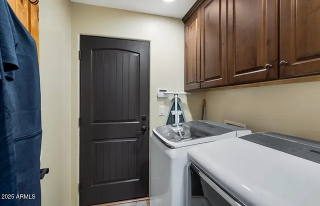 a kitchen with a sink and a refrigerator