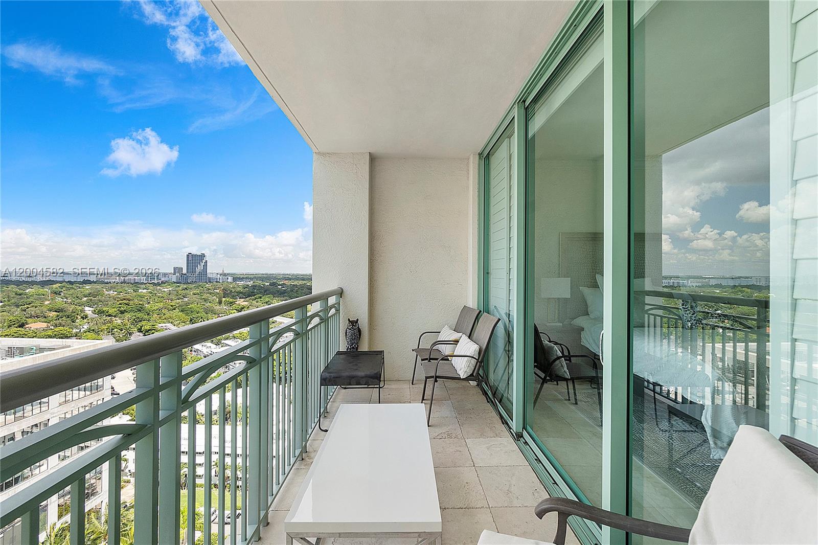 3350 Southwest 27th Avenue, Unit 1803 Miami, FL 33133 - Photo 20 of 22 a view of balcony with furniture