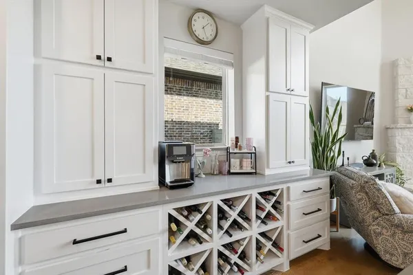 a kitchen with stainless steel appliances granite countertop a sink and a granite counter tops
