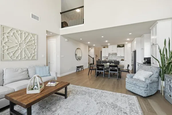a living room with furniture and a table
