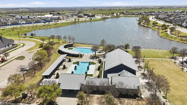 an aerial view of a house with a ocean view