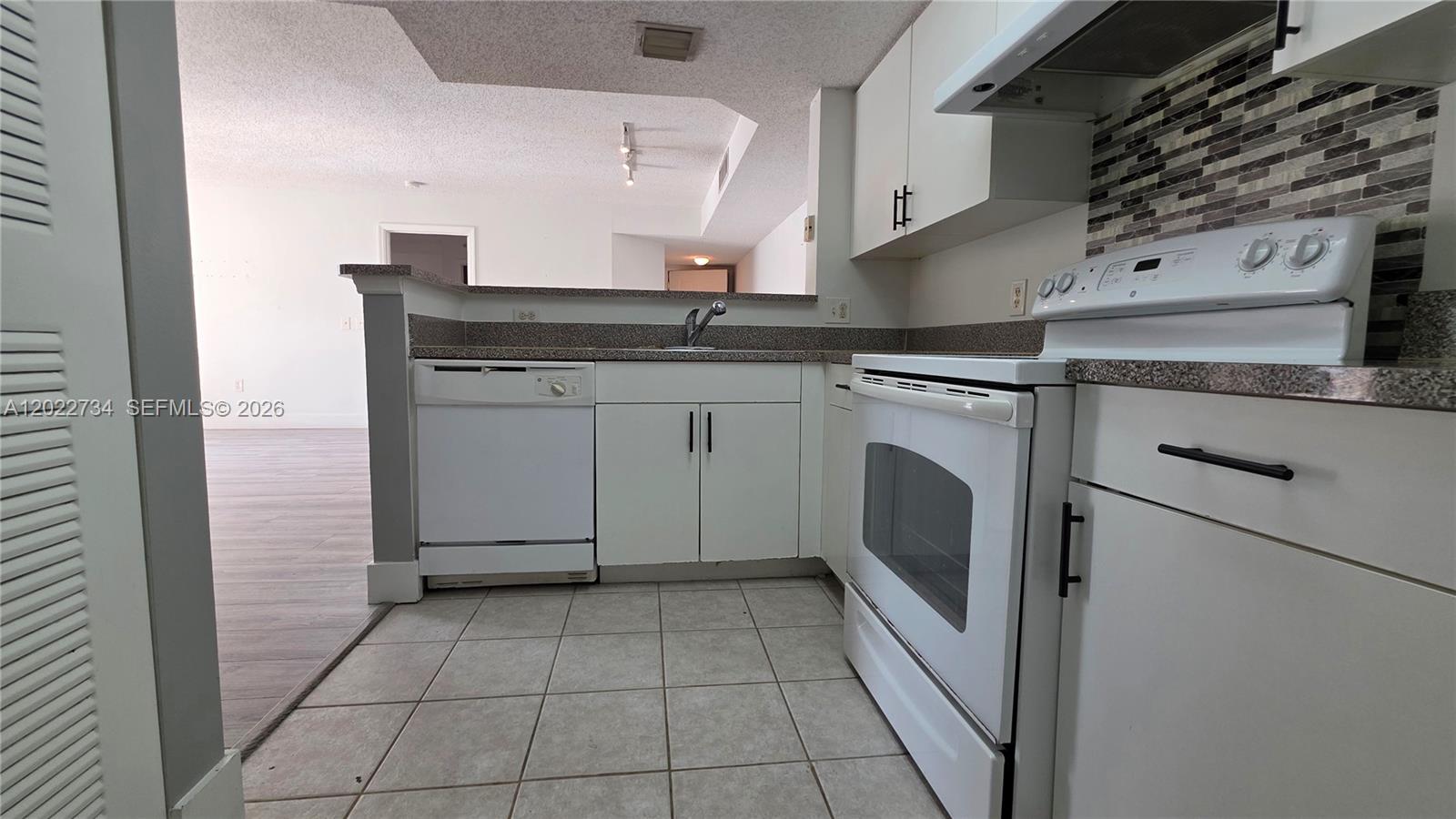 5011 Wiles Road, Unit 203 Coconut Creek, FL 33073 - Photo 1 of 17