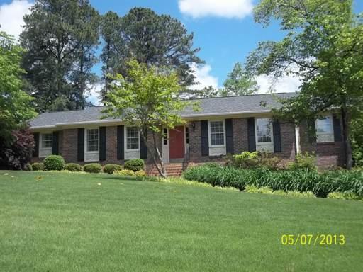 9 Beaver Run, Unit 53 Rome, GA 30165 - Photo 1 of 1 a front view of a house with a garden