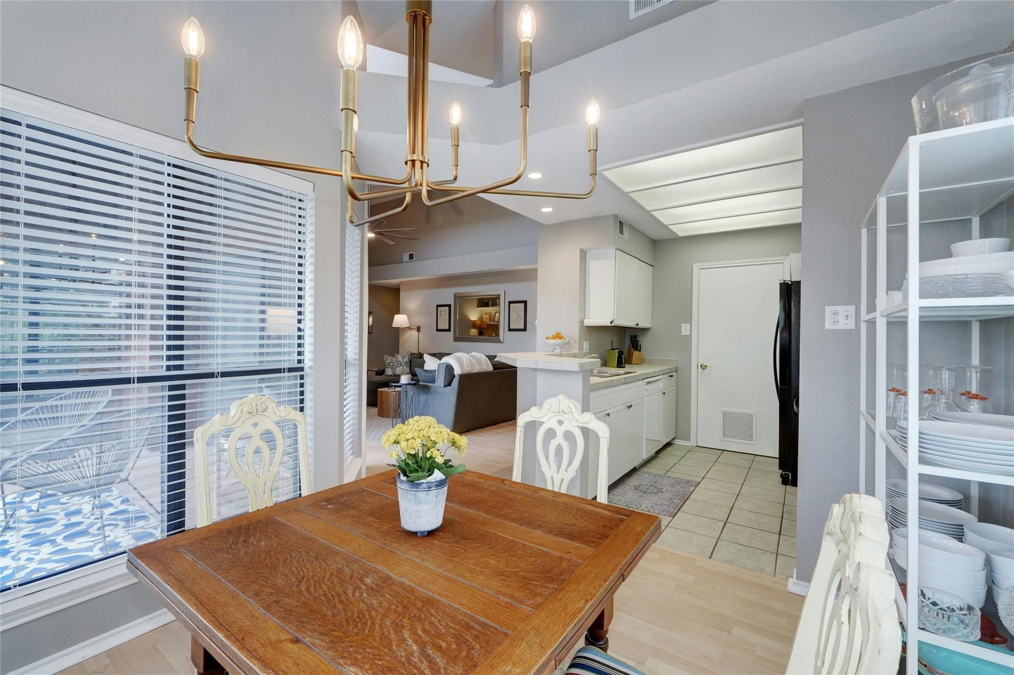 4711 Spicewood Springs Road, Unit 1201 Austin, TX 78759 - Photo 13 of 35 Easy flow from dining area back into the kitchen