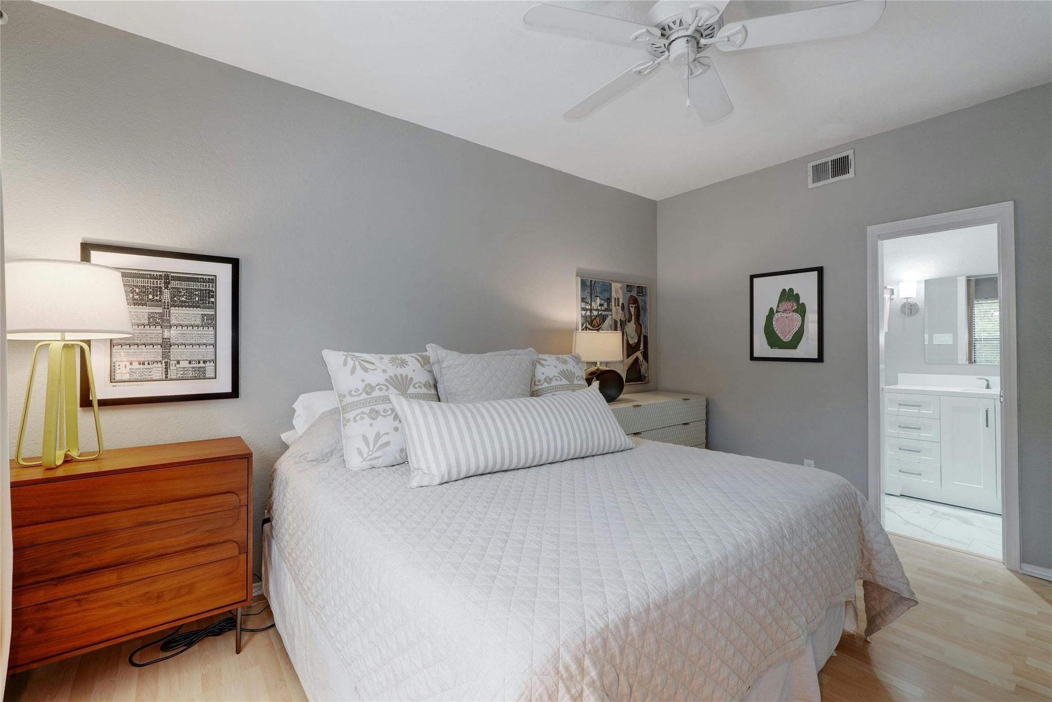 4711 Spicewood Springs Road, Unit 1201 Austin, TX 78759 - Photo 18 of 35 Another view of the primary bedroom and ensuite bathroom