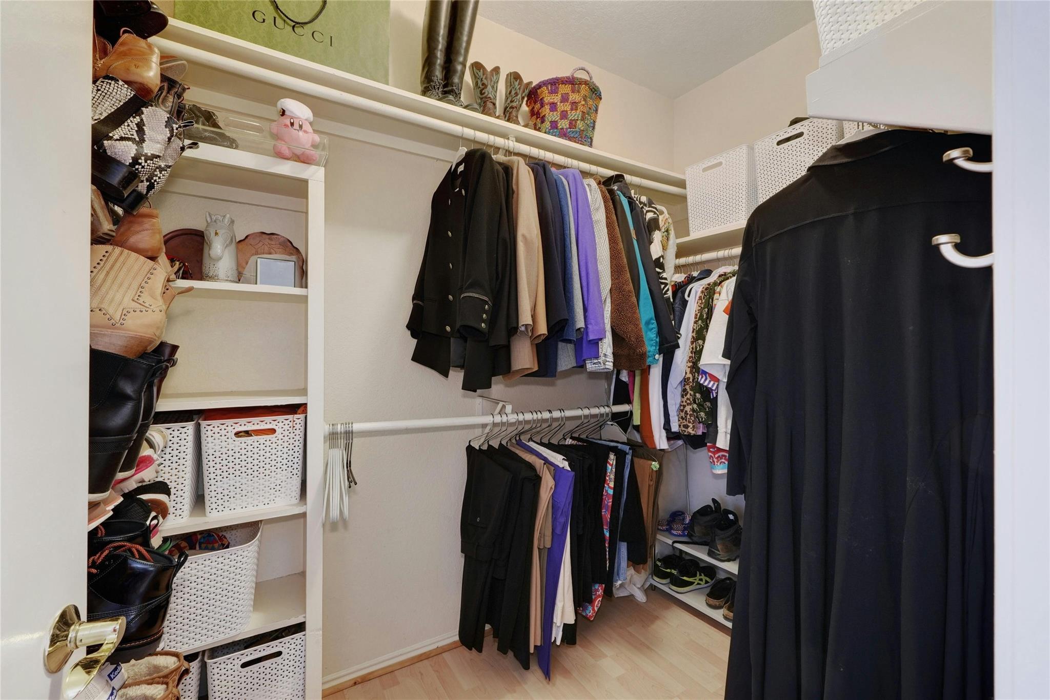 4711 Spicewood Springs Road, Unit 1201 Austin, TX 78759 - Photo 19 of 35 Walk-in closet with built-in storage