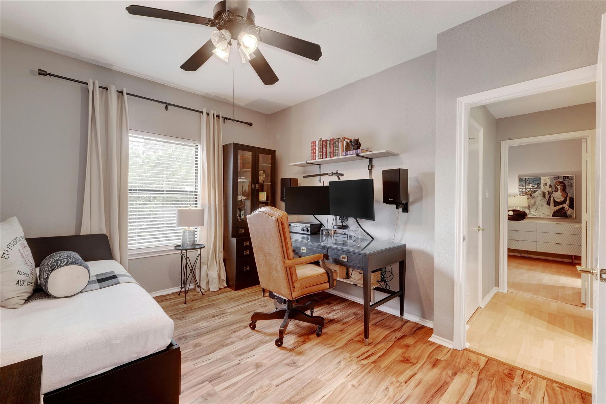 4711 Spicewood Springs Road, Unit 1201 Austin, TX 78759 - Photo 23 of 35 Versatile secondary bedroom with comfortable workspace potential