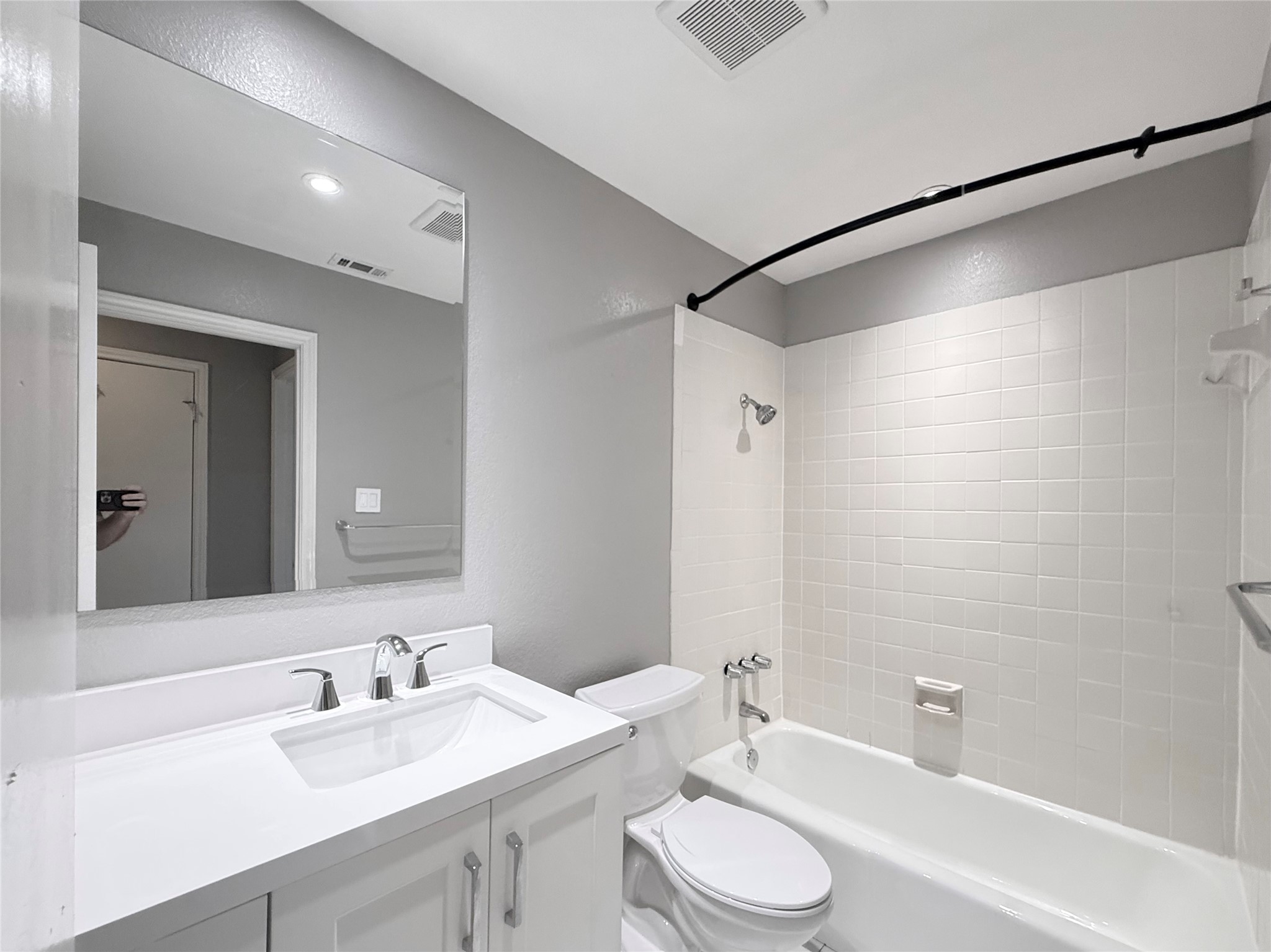 4711 Spicewood Springs Road, Unit 1201 Austin, TX 78759 - Photo 24 of 35 Updated secondary bath with clean finishes and full bathtub and shower