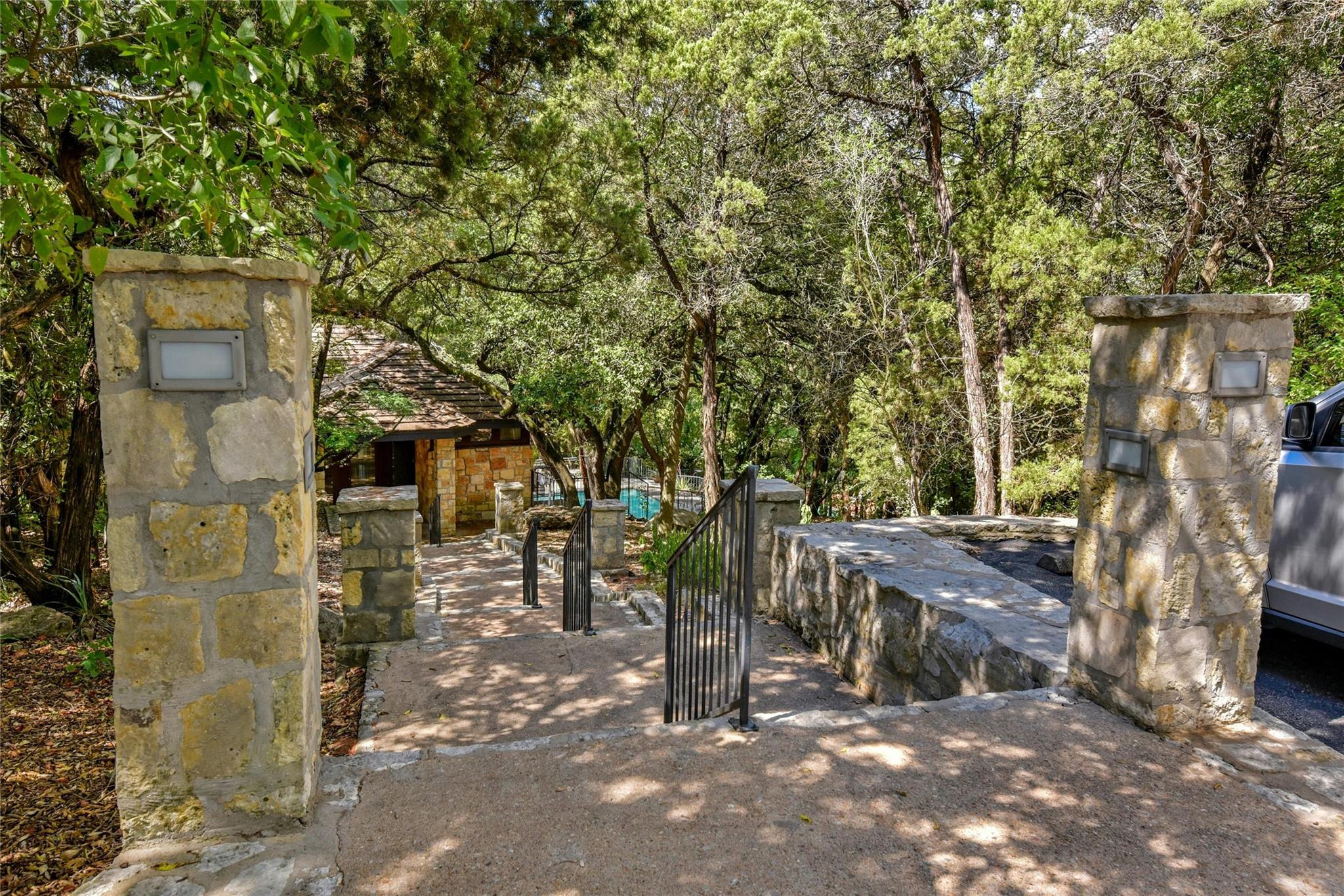 4711 Spicewood Springs Road, Unit 1201 Austin, TX 78759 - Photo 27 of 35 Nearby path leads to the community pool and clubhouse