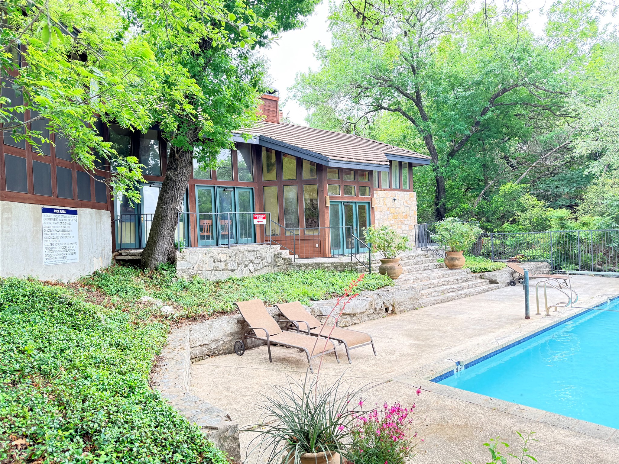 4711 Spicewood Springs Road, Unit 1201 Austin, TX 78759 - Photo 30 of 35 Rear view of clubhouse